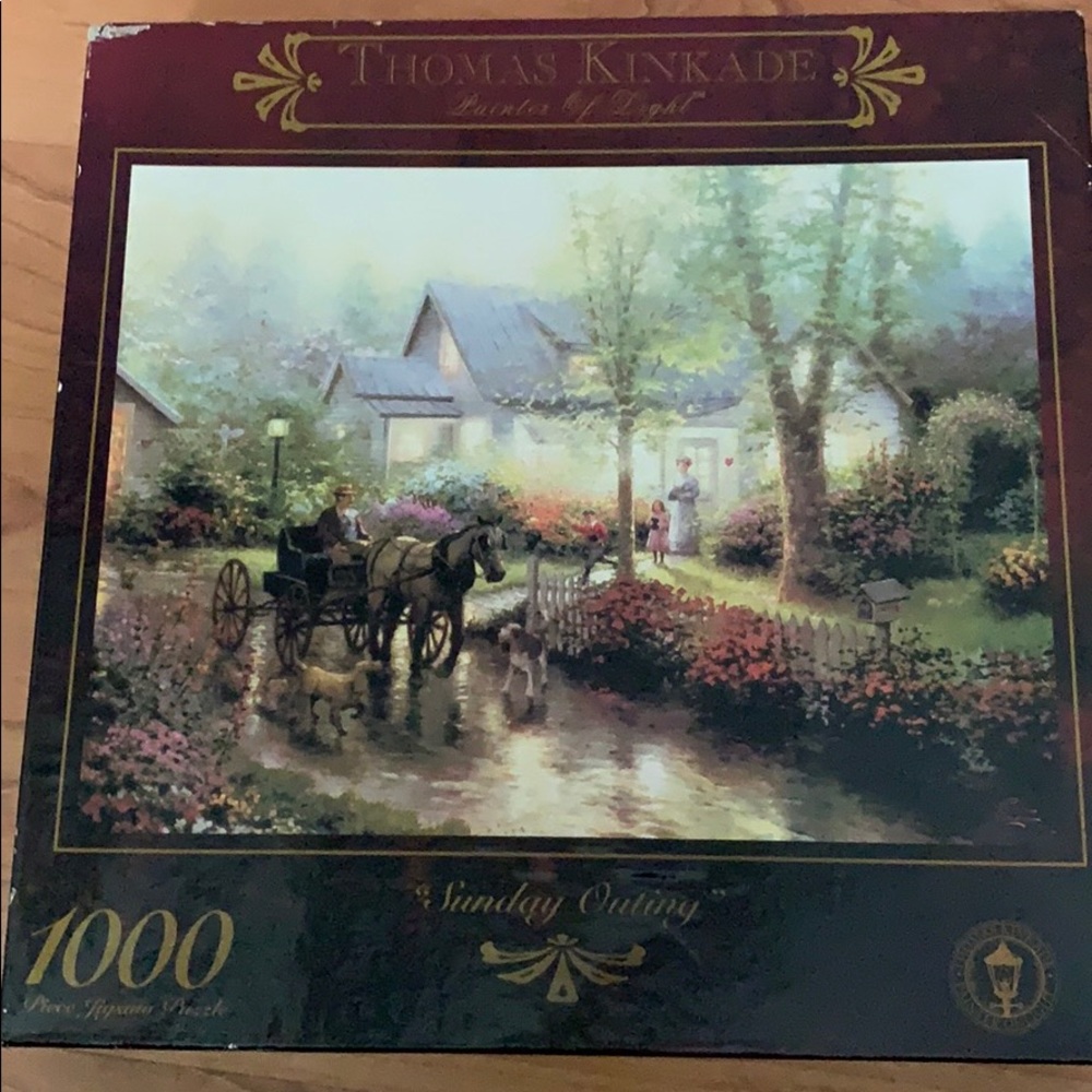 Unopened Thomas kinkade 1000 piece puzzle